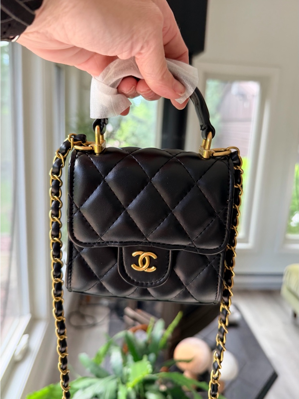CHANEL Black Quilted Mini Top-Handle Crossbody with Gold Hardware